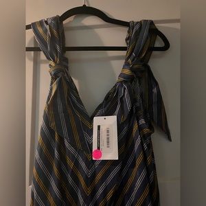 Women’s blue and yellow jumpsuit.